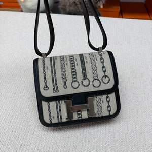 Hermès Constance 24 black leather  grey canvas palladium hardware