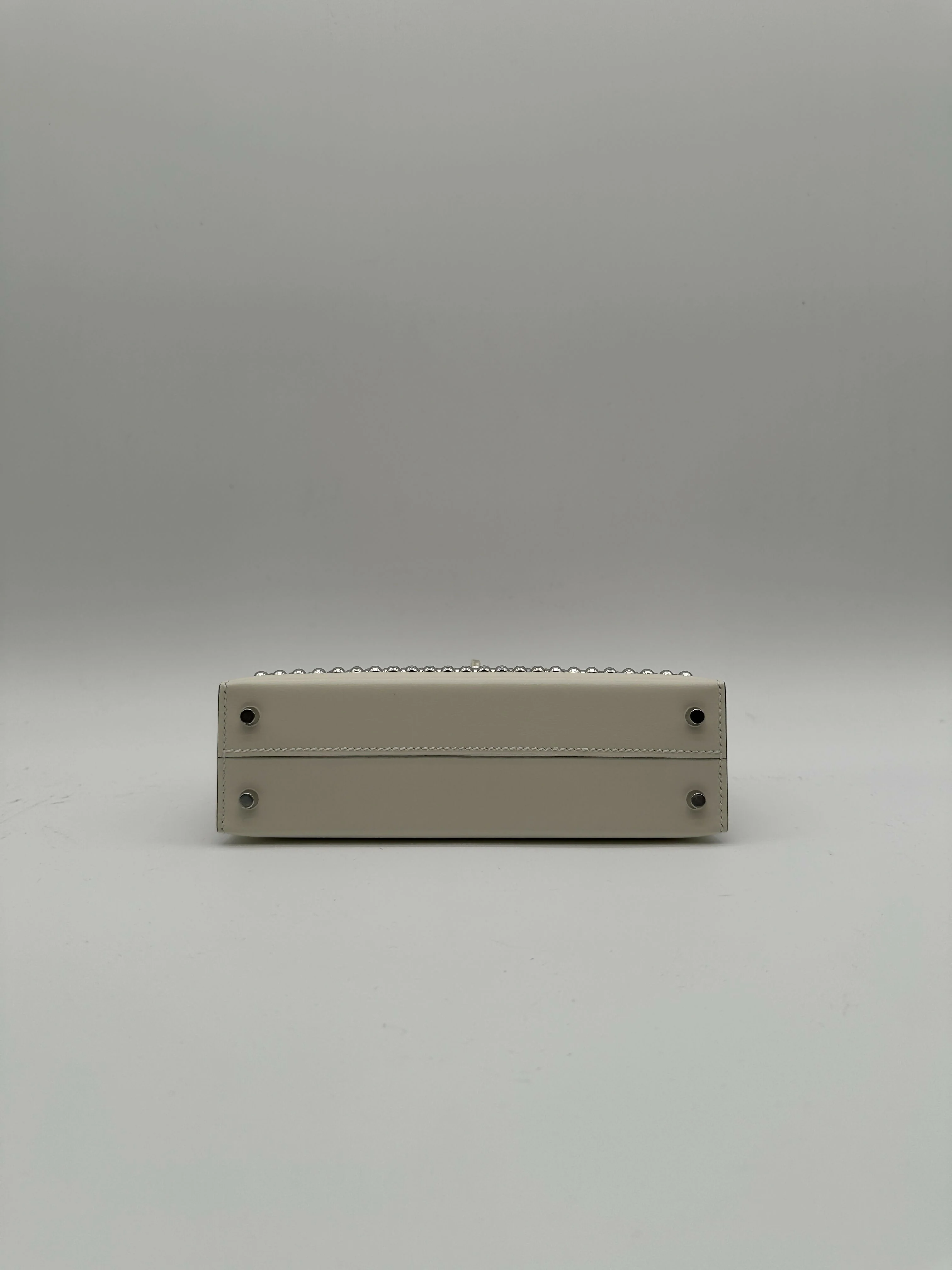 Hermès Kelly 20 Clouté Cream PHW G 2026