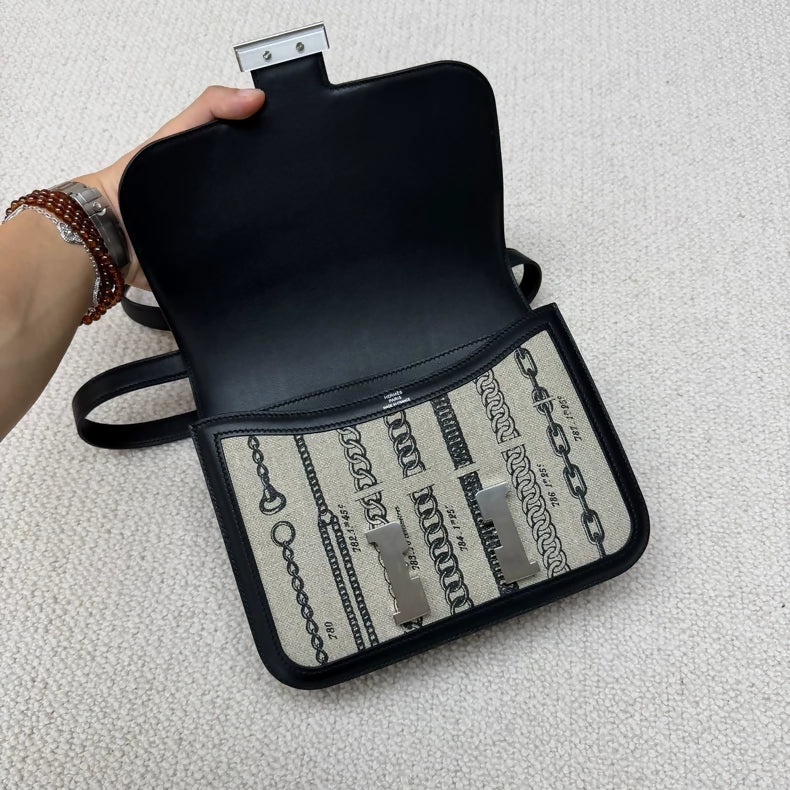 Hermès Constance 24 black leather grey canvas palladium hardware