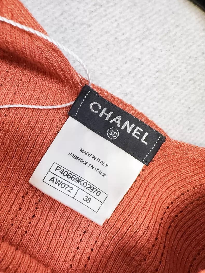 Chanel orange knit top