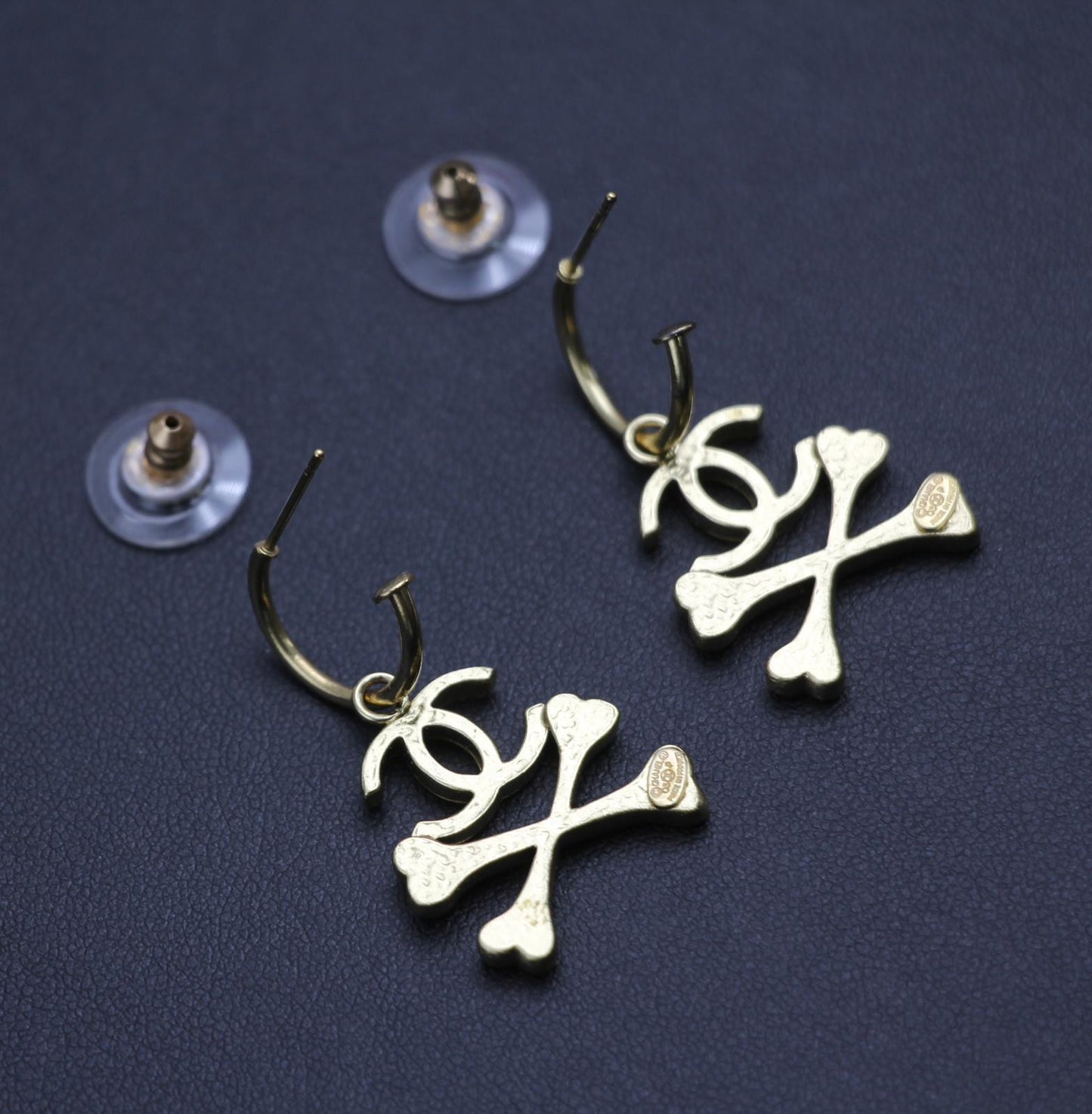 Chanel Vintage 03P Enamel Skull Orange Earrings