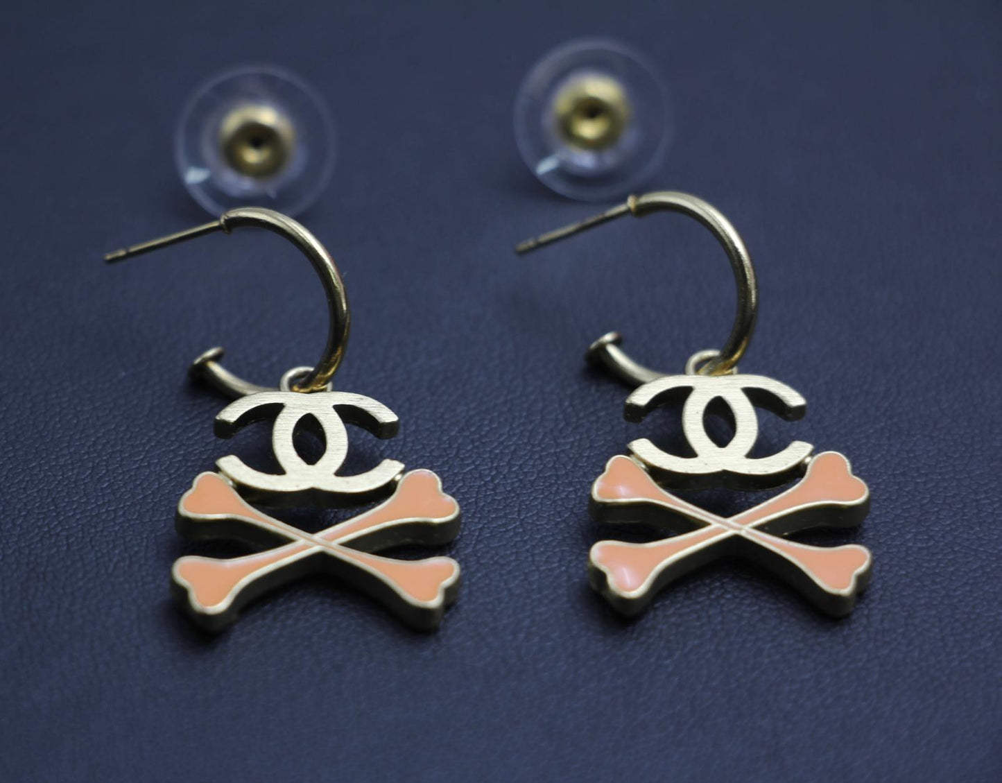 Chanel Vintage 03P Enamel Skull Orange Earrings