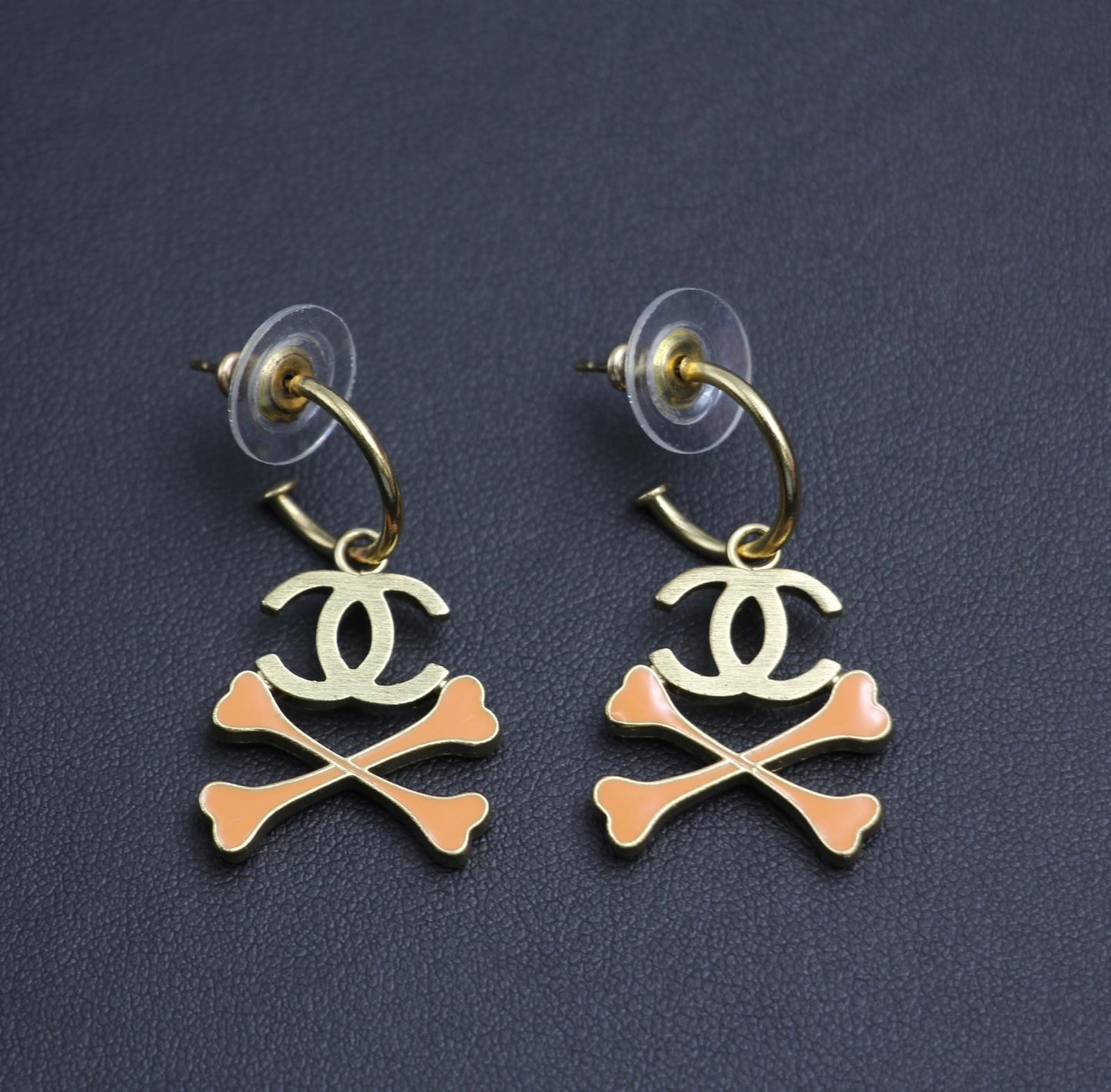 Chanel Vintage 03P Enamel Skull Orange Earrings