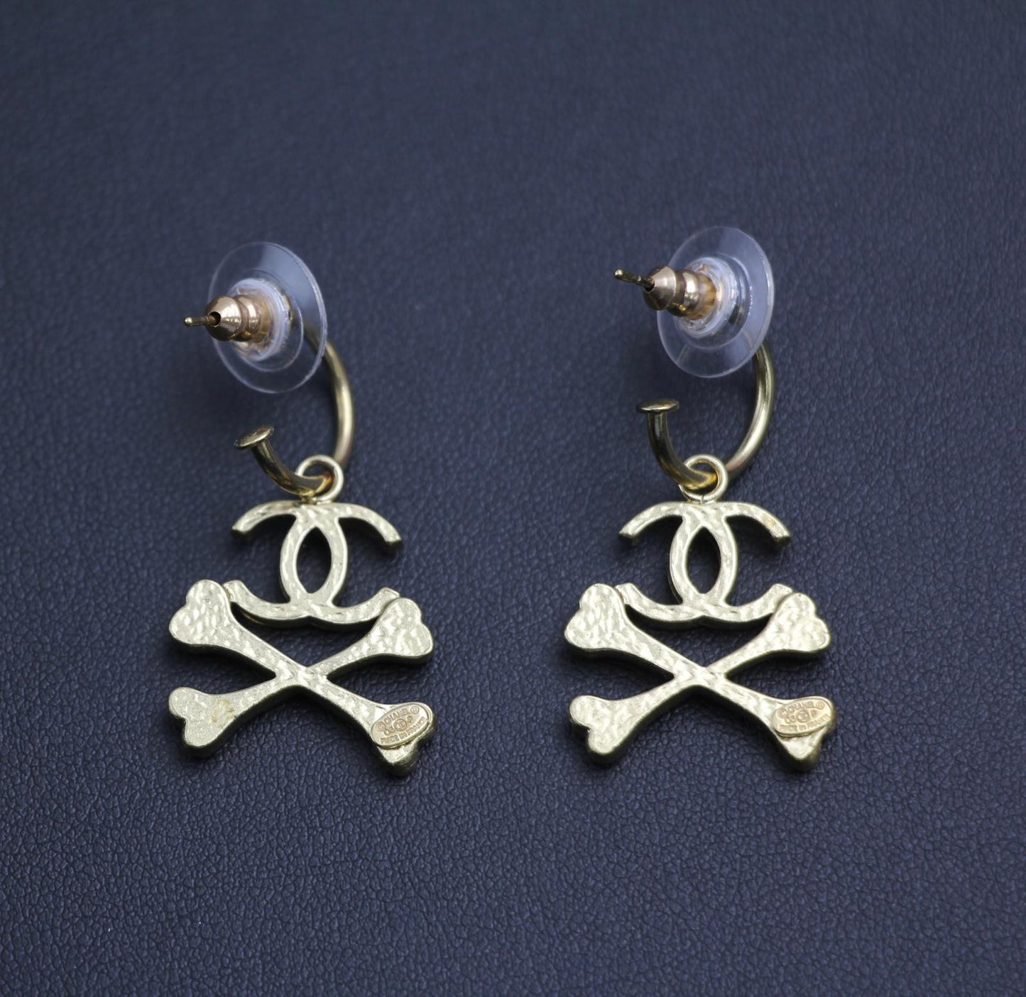 Chanel Vintage 03P Enamel Skull Orange Earrings