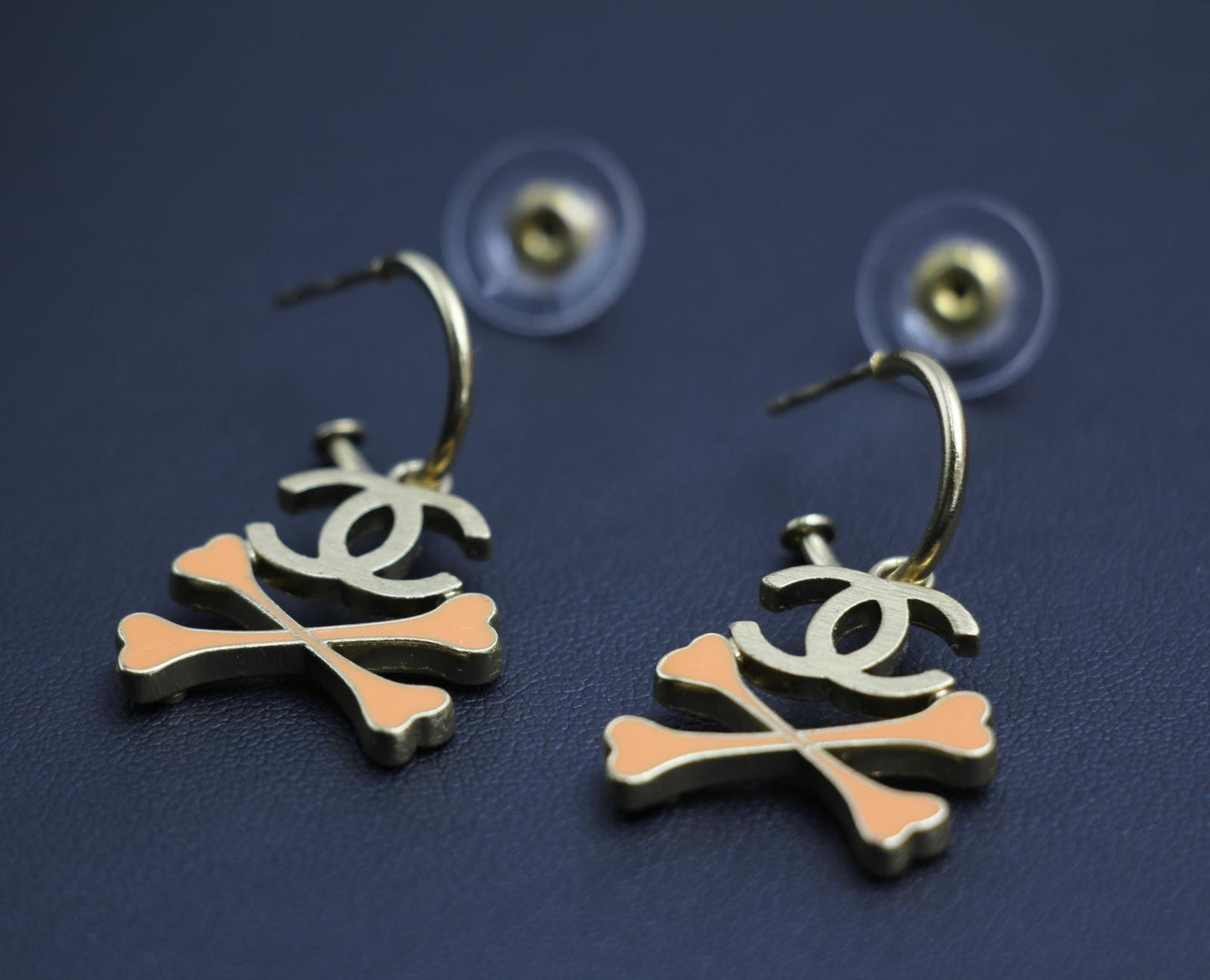 Chanel Vintage 03P Enamel Skull Orange Earrings