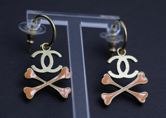 CHANEL Chanel Vintage 03P Enamel Skull Orange Earrings - Onesize Fashion Jewellery - Vintage fashion from Top Quality Luxury Designers Bag