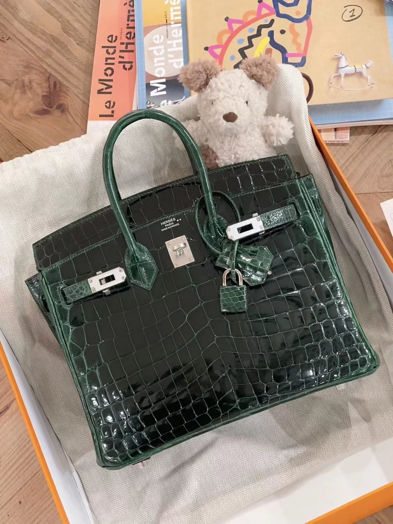 Hermès Birkin 25 emerald green shiny Crocodile leather with palladium hardware