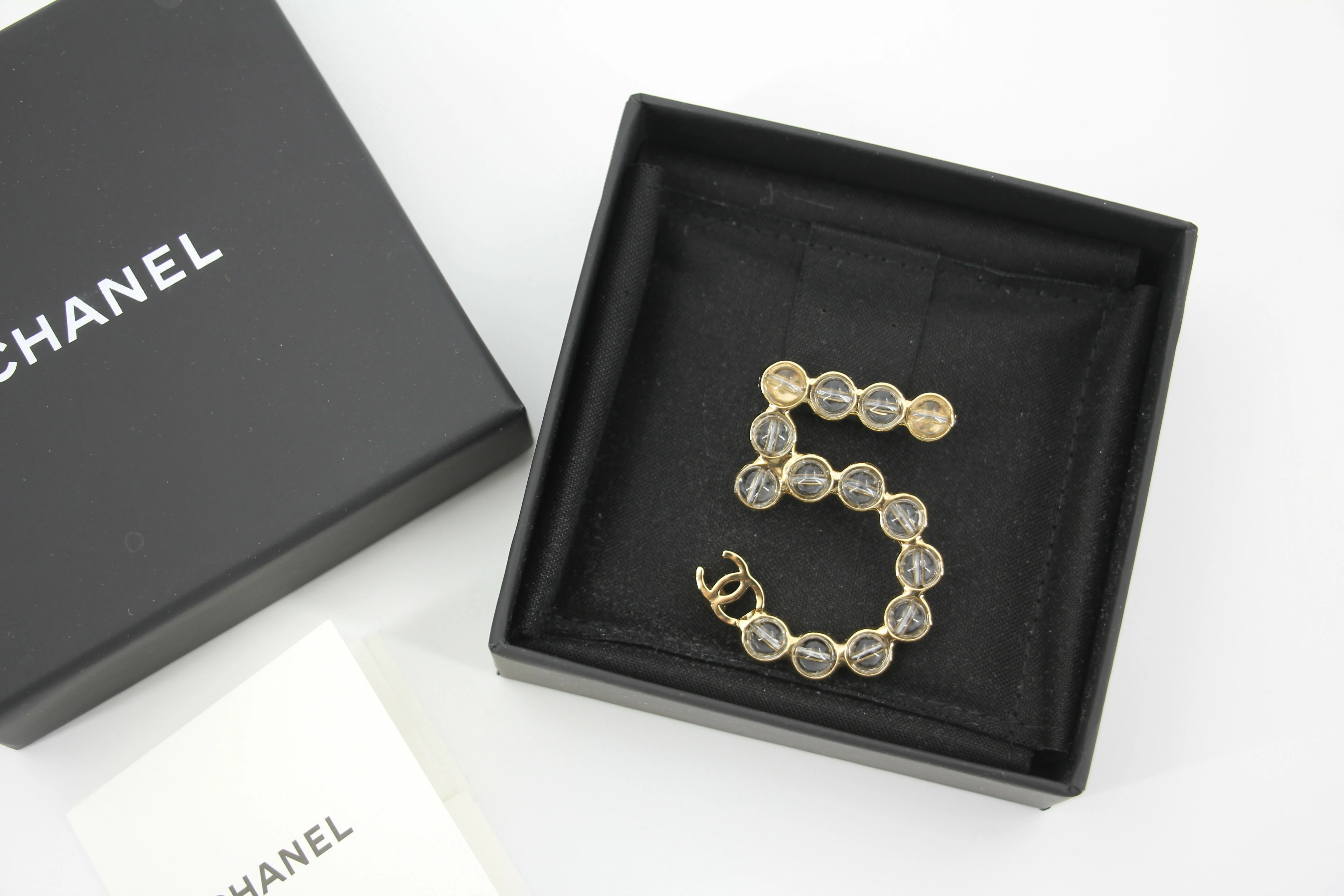 Chanel A24S Acrylic No. 5 Champagne Gold Transparent Brooch