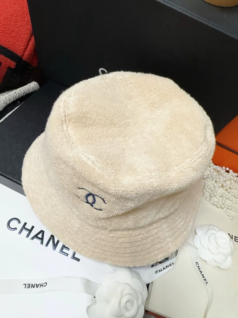 Chanel classic khaki hat with navy blue terry cloth lining