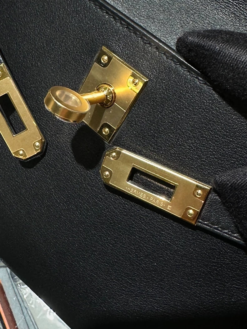 Hermes Kelly pochette Black Swift Leather with gold harwdare