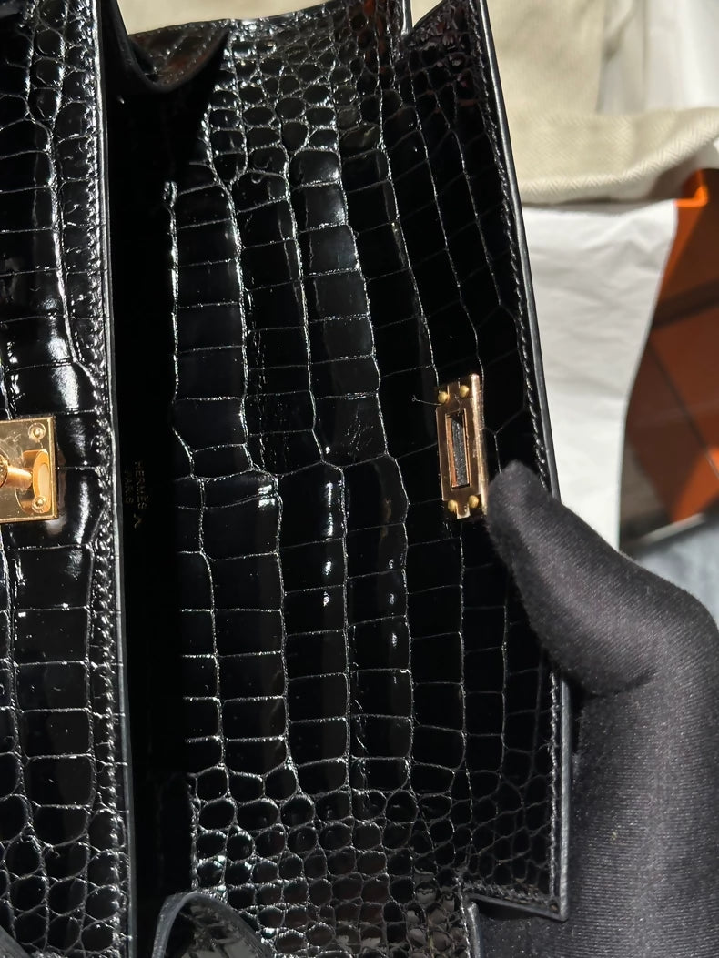 Hermes Kelly Pochette Black shiny Crocodile leather gold hardware