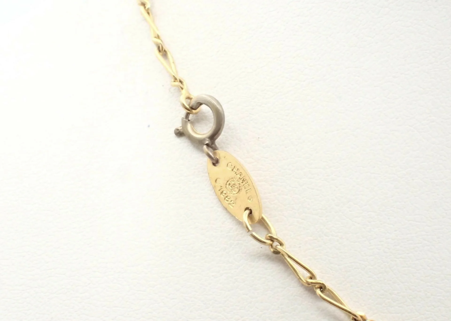 Chanel Vintage 1982 Rhinestone Gold Plated Braided Medallion Interlocking Coco Mark Necklace