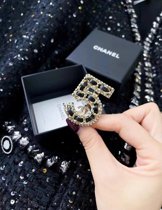 CHANEL Chanel leather and metal number 5 ring - 51-54 Fashion Jewellery - Used fashion item from Top Quality Luxury Designers Bag