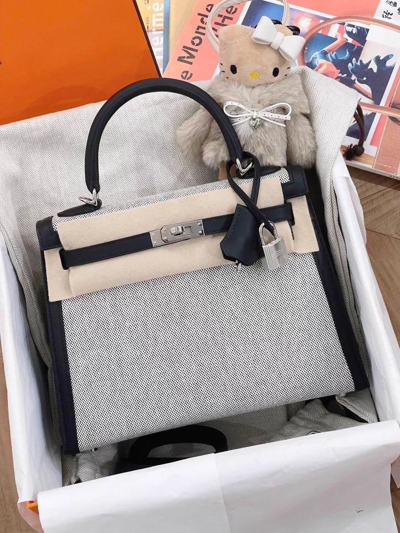 Hermès Kelly 25 black swift leather and Grey canvas palladium hardware
