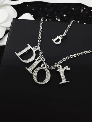 Dior bracelet with a letter pendant fully set with diamonds