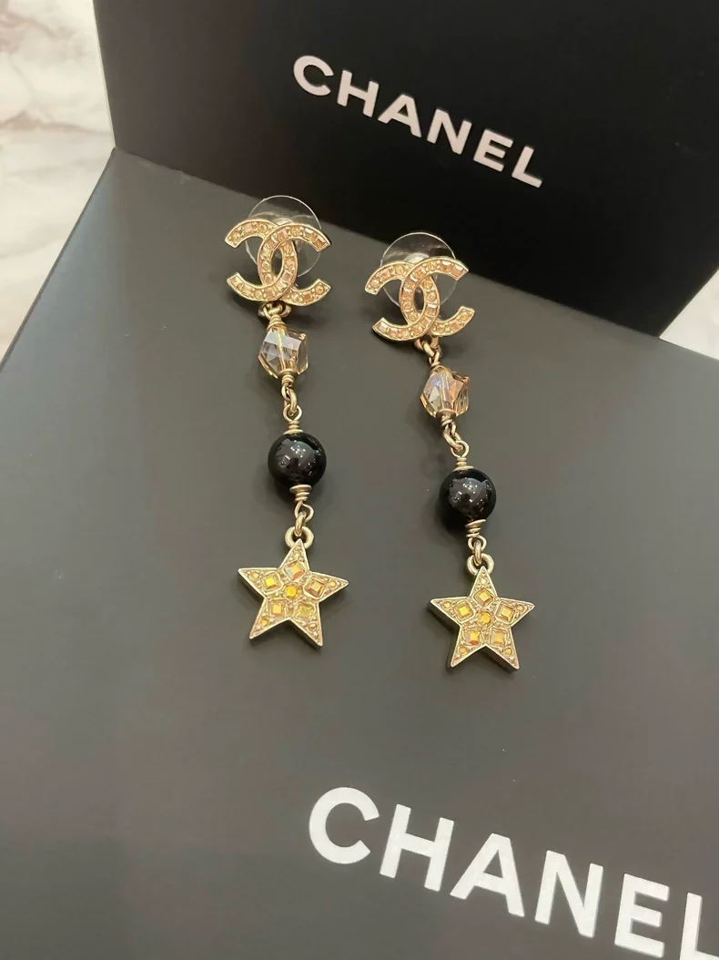 Chanel star tassel earrings