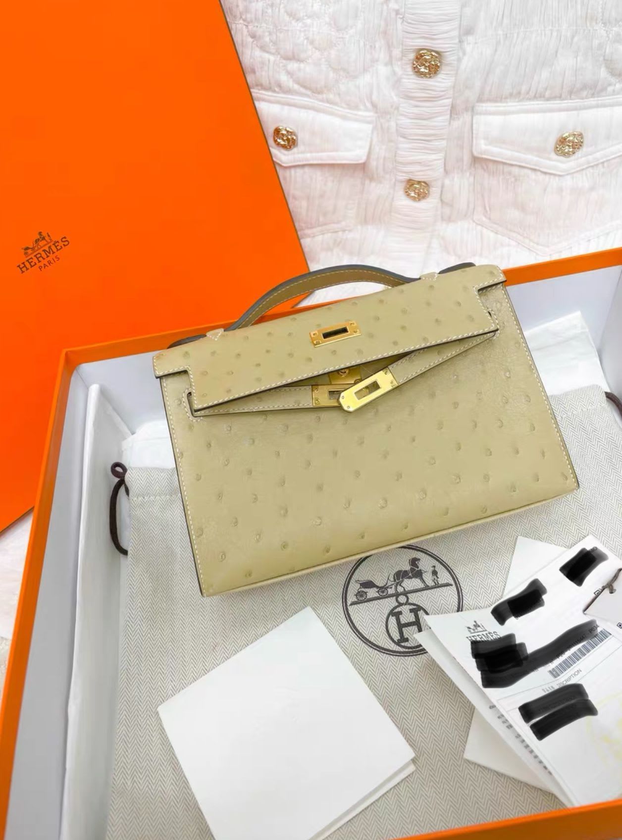 Hermes kelly Pochette ostrich leather  gold hardware