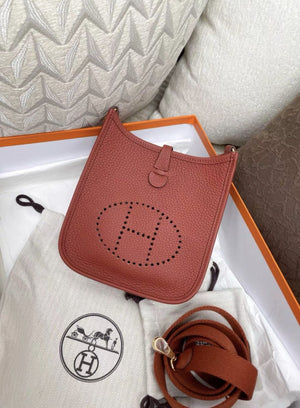 Hermes Mini evelyne brick red gold