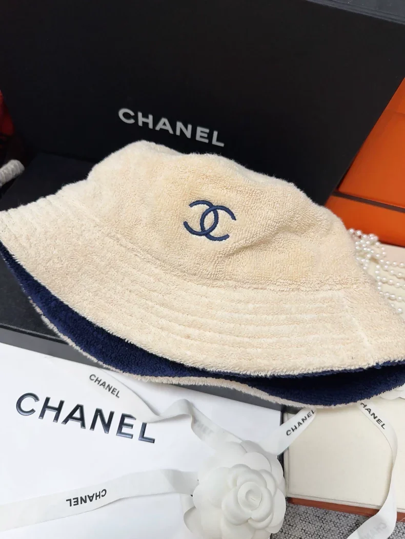 Chanel classic khaki hat with navy blue terry cloth lining