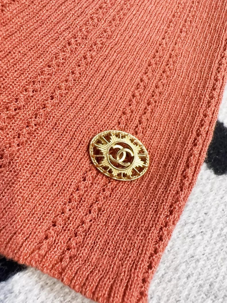 Chanel orange knit top