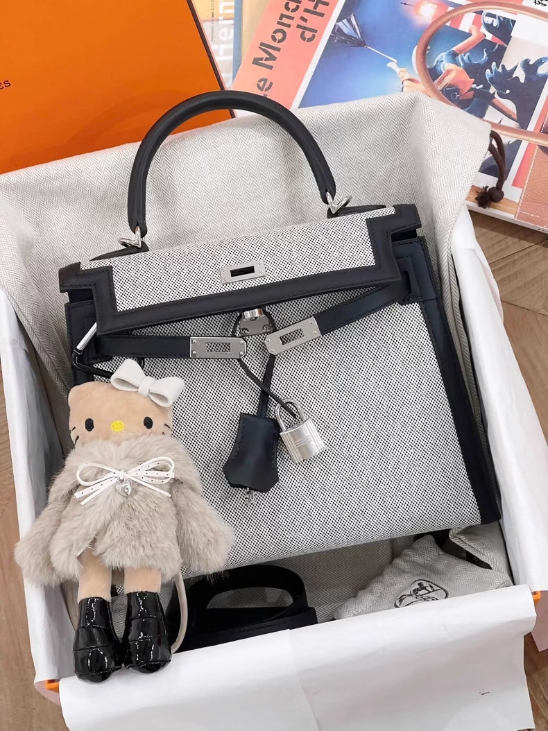 Hermès Kelly 25 black swift leather and Grey canvas palladium hardware