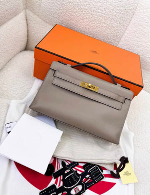 Hermès Kelly Pochette Gris Swift Gold Hardware