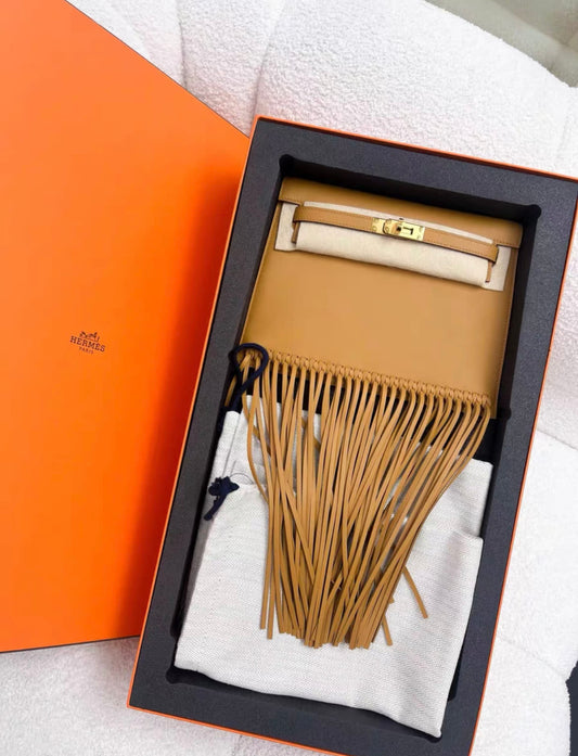 Hermès Hermes Kelly Danse Fringe Bag Tabac Sesame with Gold Hardware - Brand new Crossbody Bag - Secondhand luxury from Top Quality Luxury Designers Bag