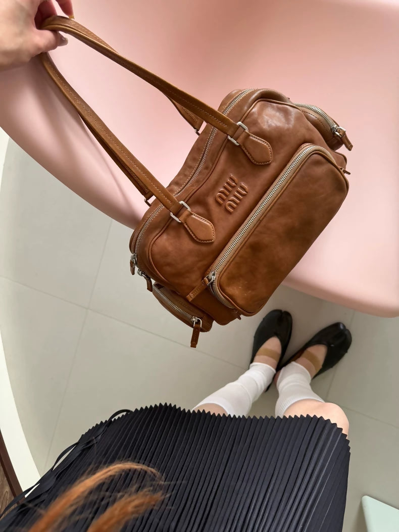 Miu Mius Spring/Summer 2024 vintage style brown tote