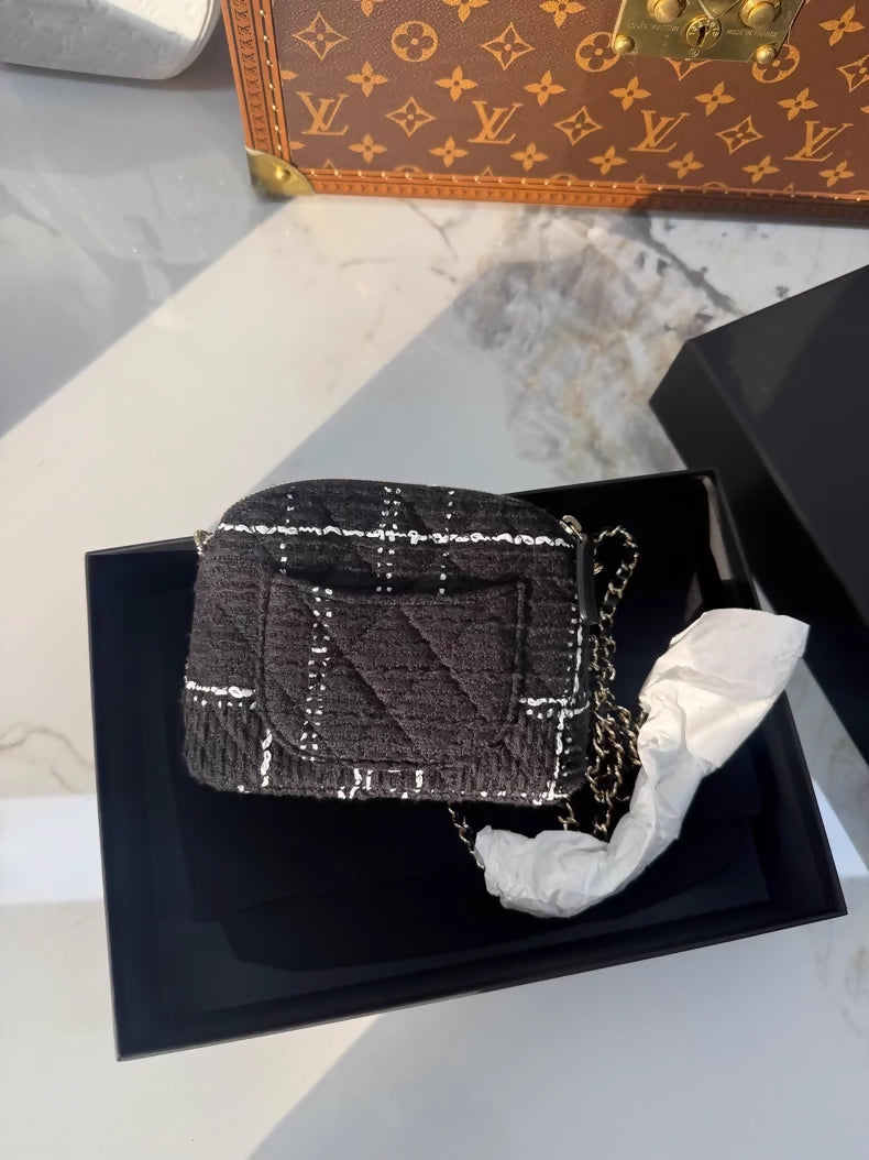 Chanel VIC 24k black and white checkered tweed mini shell bag with chain strap