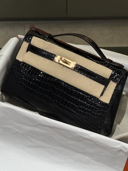 Hermes Kelly Pochette Black shiny Crocodile leather gold hardware