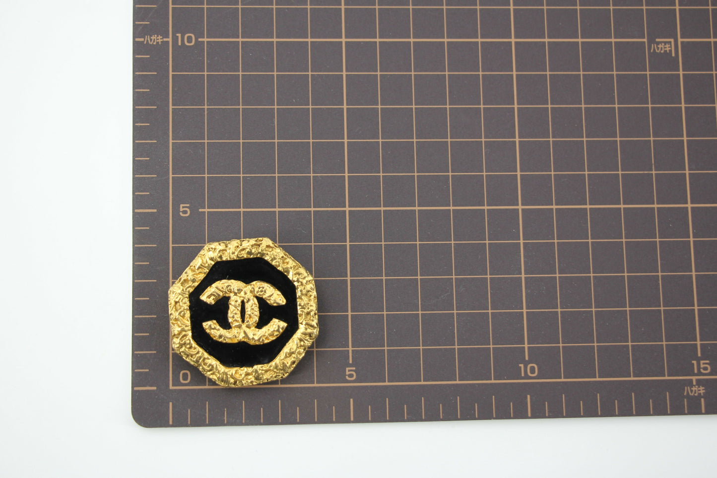 Chanel Vintage 93A Lava Octagonal CC Logo Black and Gold Tone Brooch