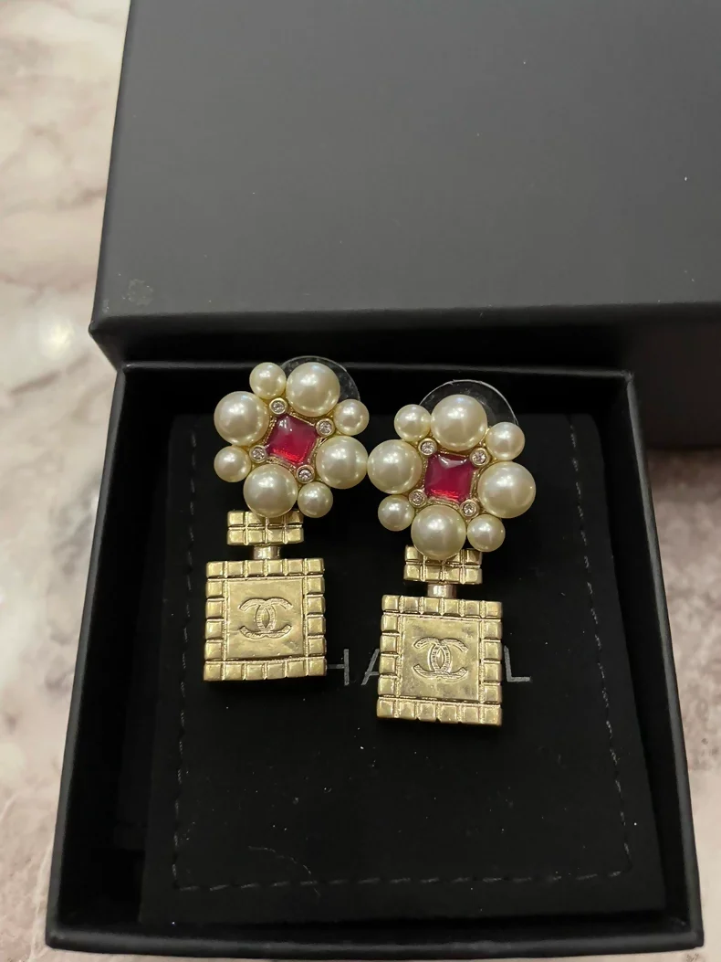 Chanel 21P floral perfume bottle earrings