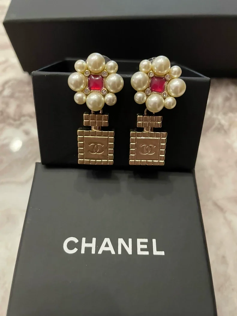 Chanel 21P floral perfume bottle earrings