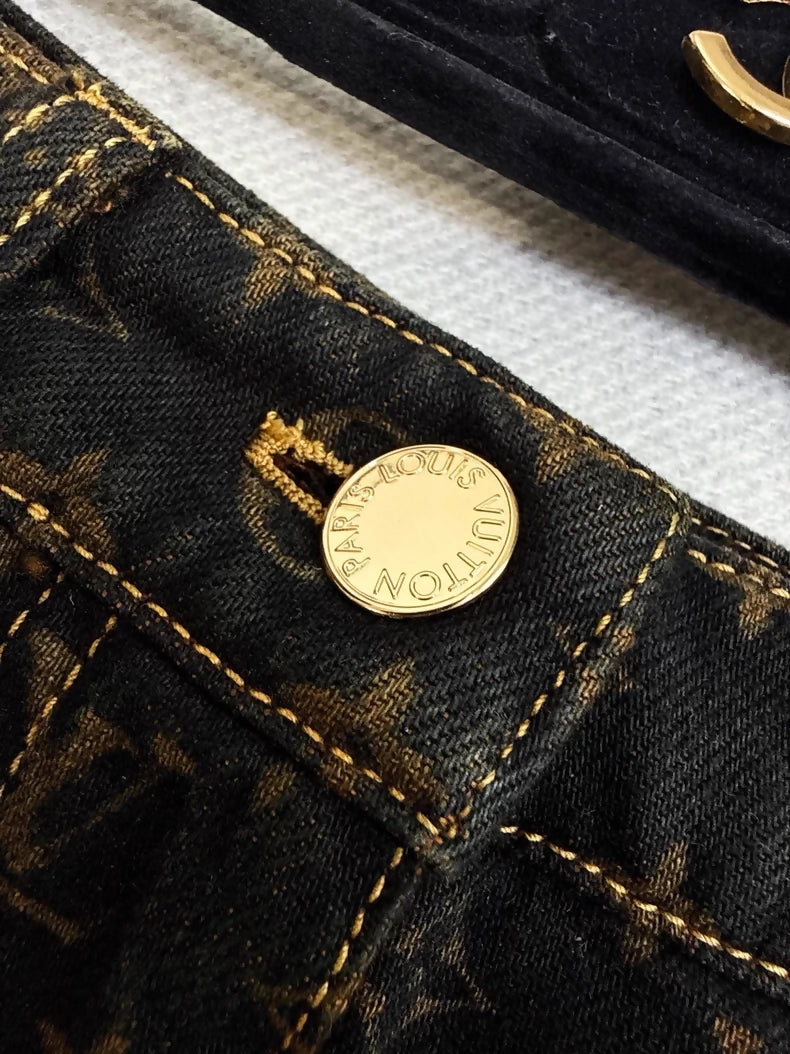 Louis Vuitton (LV) black and brown wide-leg jeans with all-over monogram print