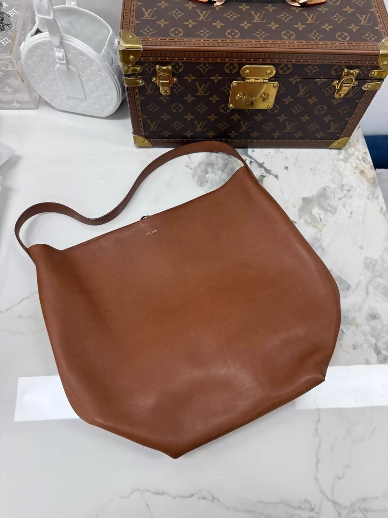 The Row NS PARK large bucket bag in saddle leather