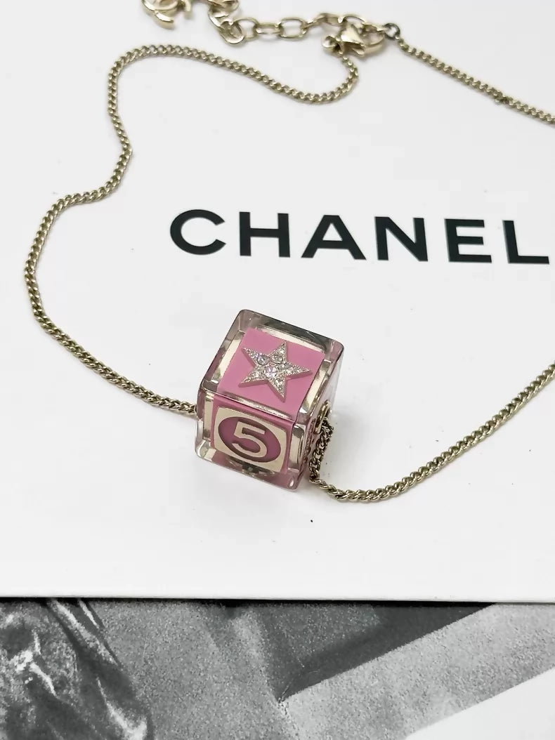 Chanel Spring/Summer 2022 pink dice necklace